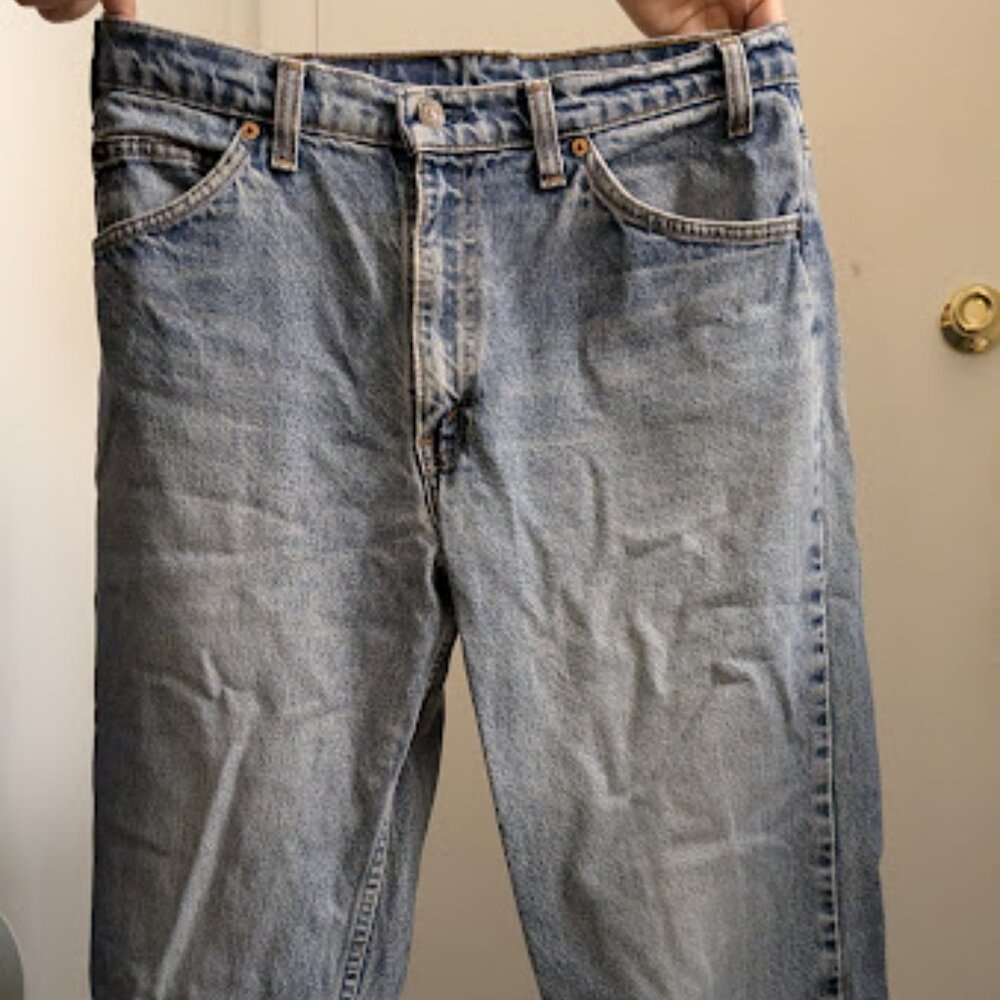 Medium Wash Levi's Jeans with Lightly Distressed Edges at Boot |  W32 L34